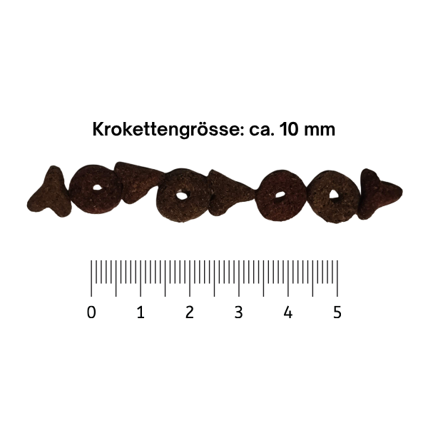 Abbildung der Krokettengrösse ca. 10 mm des Trockenfutter Premium Cat Geflügel&Fisch für Katzen